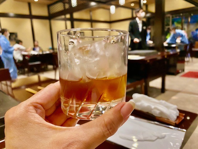 Drinking Ume shu plum wine at a traditional Japanese restaurant