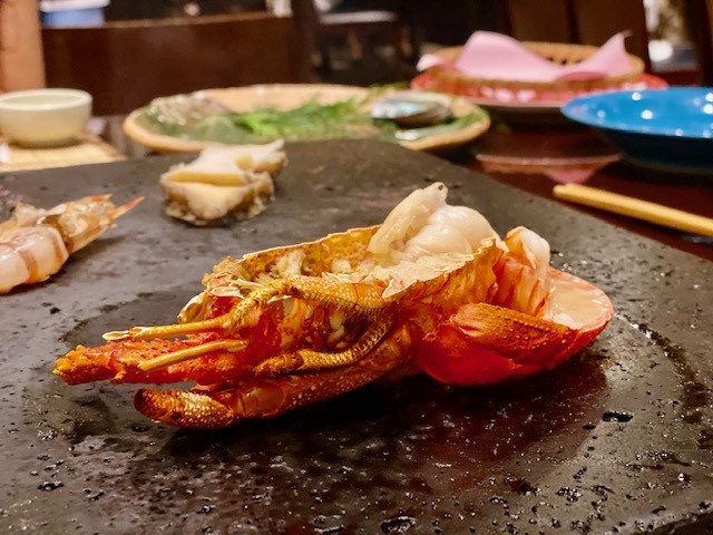  half lobster, still in its shell, cooked right at the table, at Mokushundo, a traditional Japanese restaurant at Chinzanso in Tokyo,