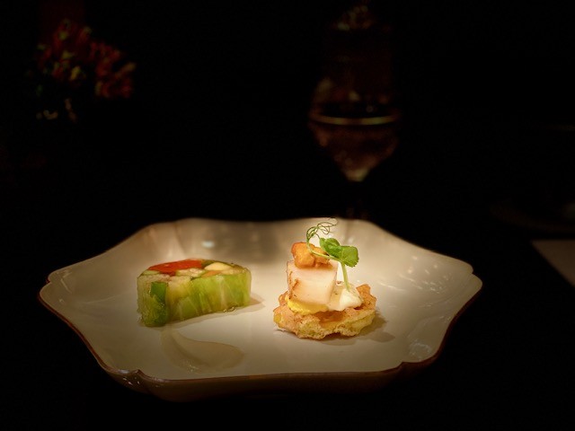 summer vegetable terrine and a corn waffle topped with scallop and sea urchin