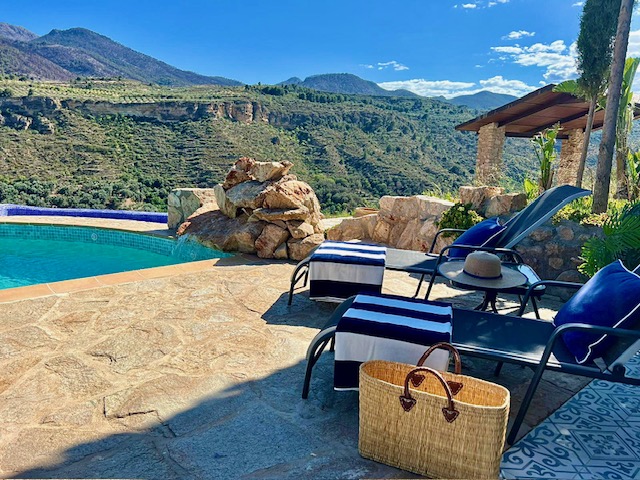 Poolside at the luxury hacienda La Esperanza Granada in Spain