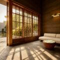 The minimalist lobby at Numazu Club, a Michelin One Key luxury retreat in Shizuoka, Japan, overlooking the reflecting pond and estate gardens. Photographed by Travelife Magazine.